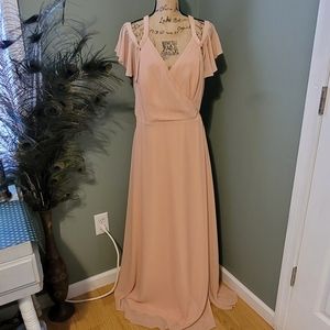 Lulu's Blush Wrap Dress with arm drapes.